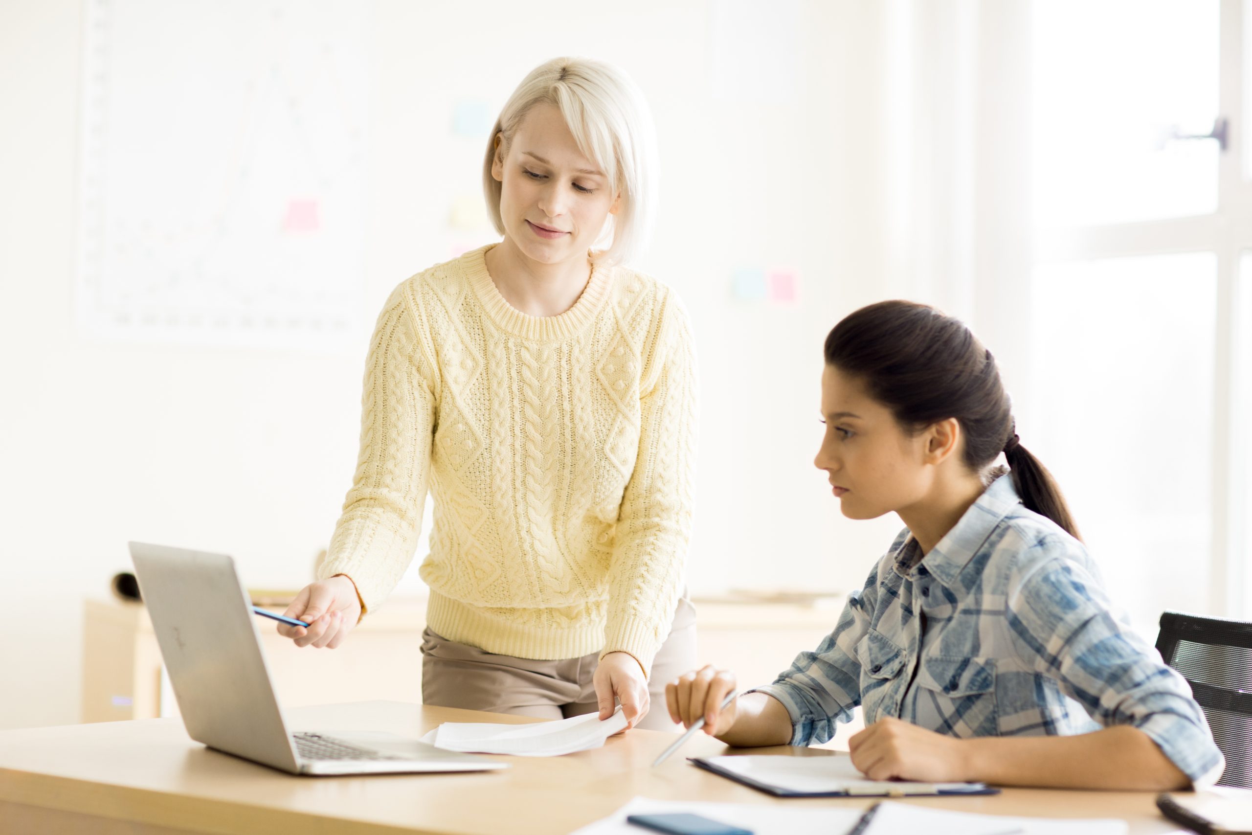 females working neat office together scaled